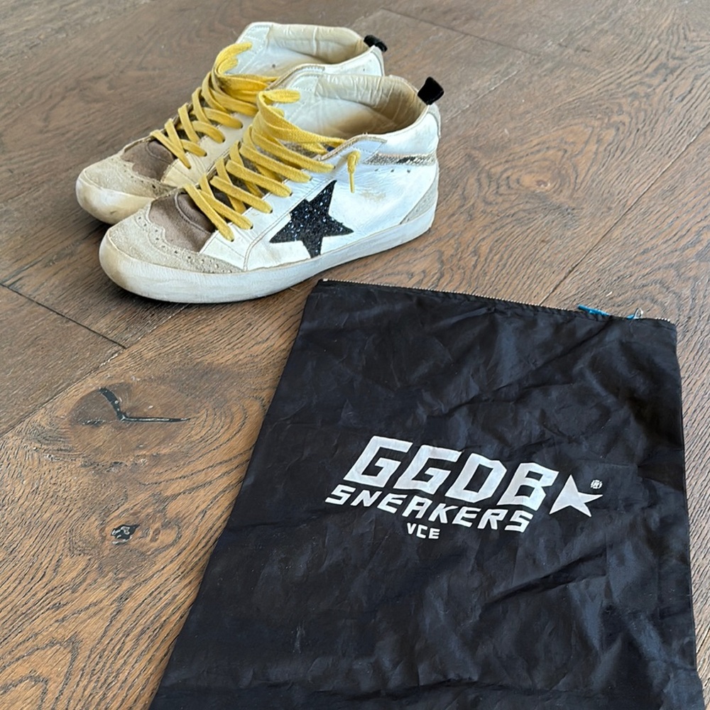 Golden Goose Beige High-Tops with Black Star and Yellow Laces
